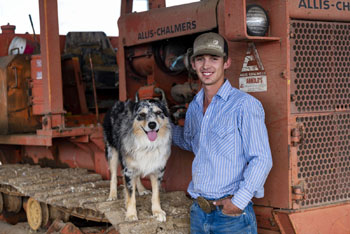 Rice dog and its owner on tractor