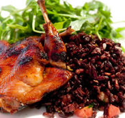 Grilled Solano County Quail with Black Japonica Rice, arugula salad, grilled pineapple salsa