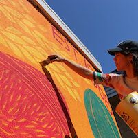 artist painting a mural
